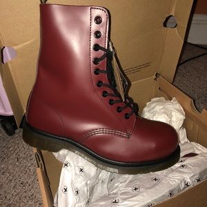 Red leather Docs. Never worn.